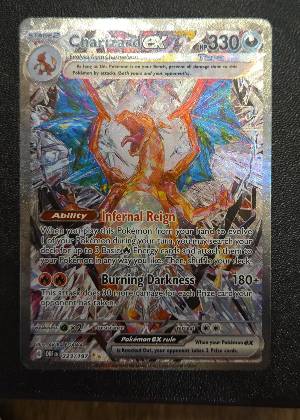 Charizard ex, graded 9.0