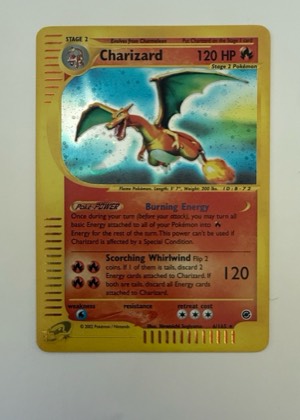 Charizard (6), graded 8.5