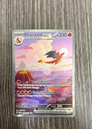 Charizard ex, graded 9.0