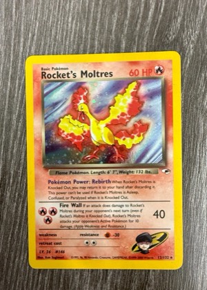 Rocket's Moltres, graded 7.5