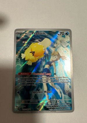 Misty's Psyduck, graded 9.0