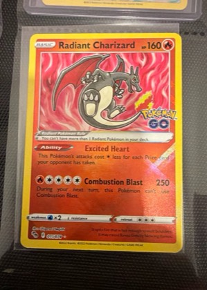 Radiant Charizard graded 9