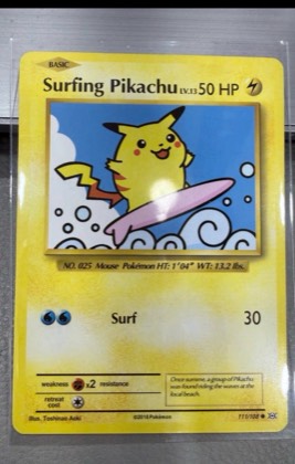 Surfing Pikachu, graded 8.0