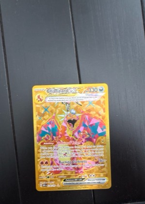 Charizard ex, graded 9.0