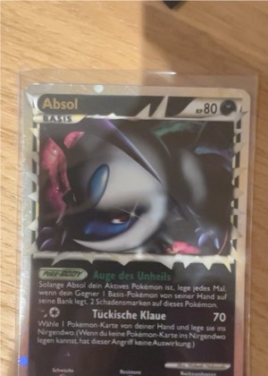 Absol, graded 7.0