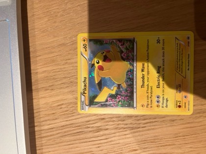 Pikachu (Collector Chest), graded 7.5