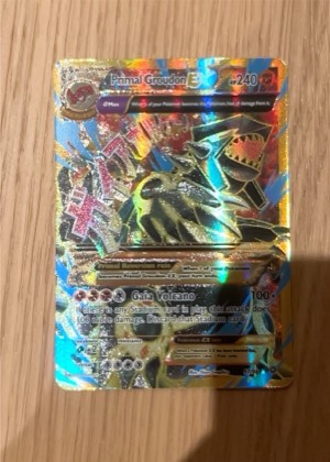 Primal Groudon EX (Shiny Full Art), graded 8.5