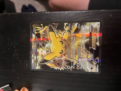 Pikachu EX, graded 4.5