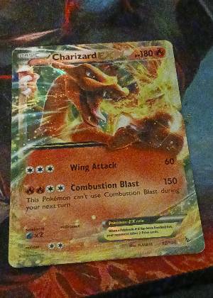 Charizard EX, graded 8.0
