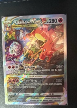 Charizard VSTAR graded 8