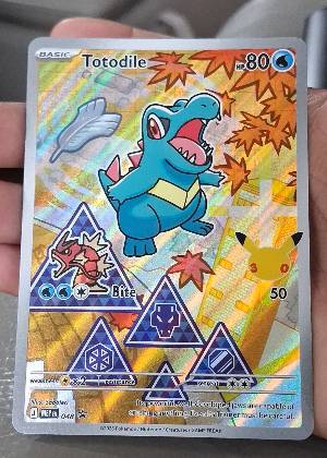 Totodile, graded 9.5