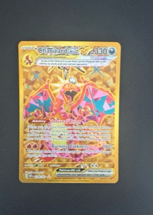 Charizard ex, graded 9.0