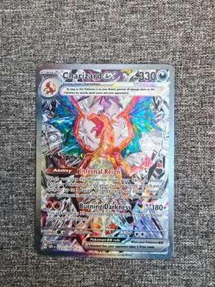 Charizard ex, graded 9.0