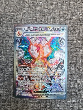 Charizard ex, graded 9.0