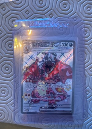 Charizard ex, graded 9.0