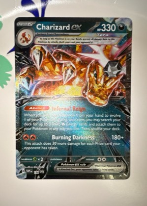 Charizard ex, graded 9.0