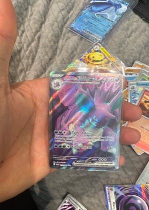 Team Rocket's Nidoking ex, graded 2.5