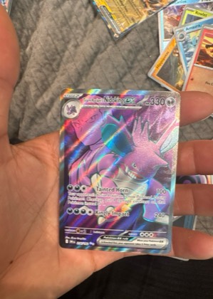 Team Rocket's Nidoking ex, graded 9.5