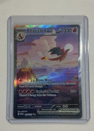 Charizard ex, graded 8.5