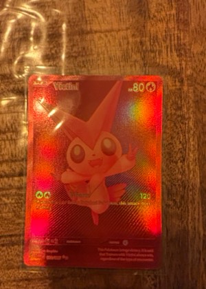Victini (98 Full Art), graded 8.0