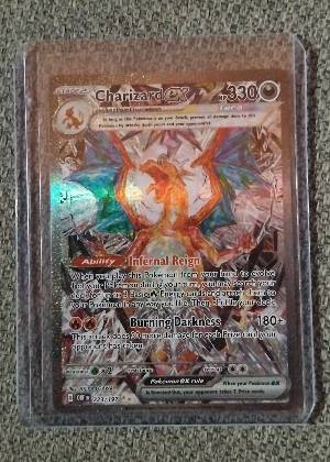 Charizard ex, graded 9.0