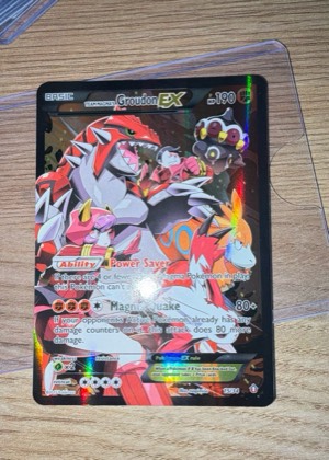 Team Magma's Groudon EX, graded 7.5
