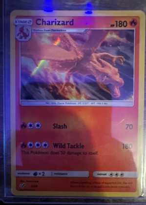Charizard GX, graded 7.5