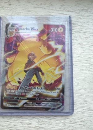 Pikachu VMAX, graded 8.0
