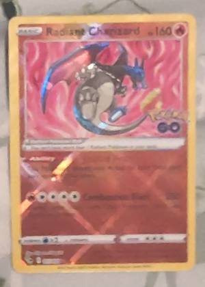 Radiant Charizard, graded 8.0