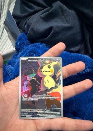 Team Rocket's Mimikyu graded 9