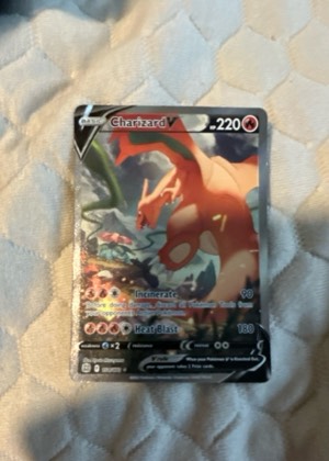 Charizard V graded 8