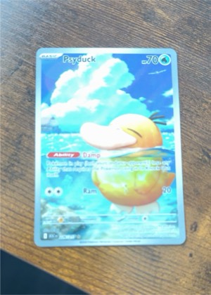 Psyduck (Holo Common), graded 9.0