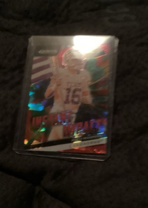 Arch Manning, graded 7.5