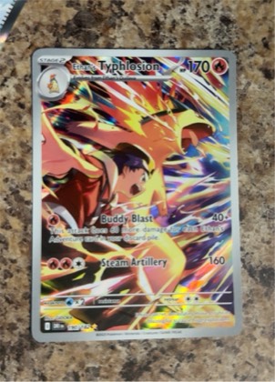 Ethan's Typhlosion graded 8
