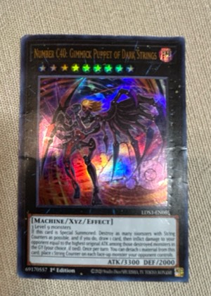Number C40: Gimmick Puppet of Dark Strings, graded 7.0
