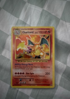 Charizard graded 8