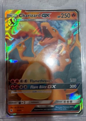 Charizard GX, graded 8.5