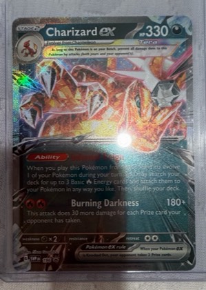 Charizard ex, graded 9.0