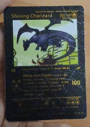 Shining Charizard, graded 2.5