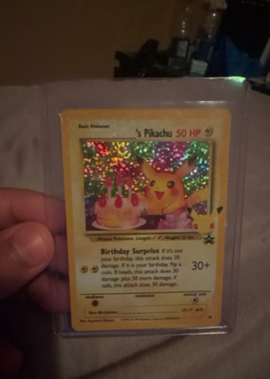 ______'s Pikachu, graded 8.0