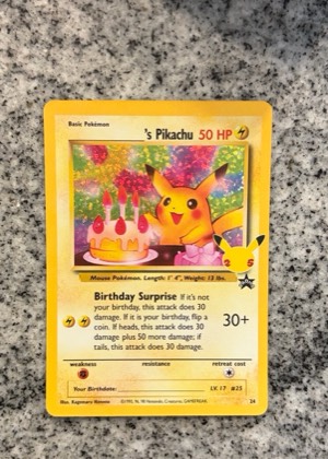 ______'s Pikachu, graded 8.5