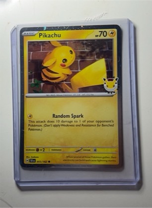 Pikachu - 051/162 (Cosmo Holo) graded 7