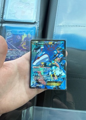 Team Aqua's Kyogre EX, graded 9.0