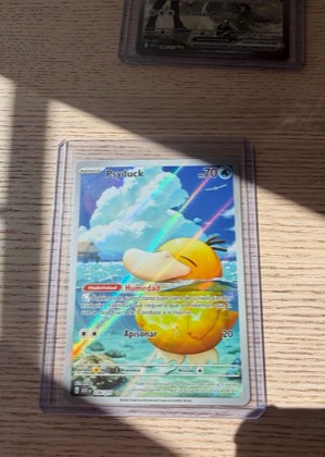Psyduck, graded 9.0